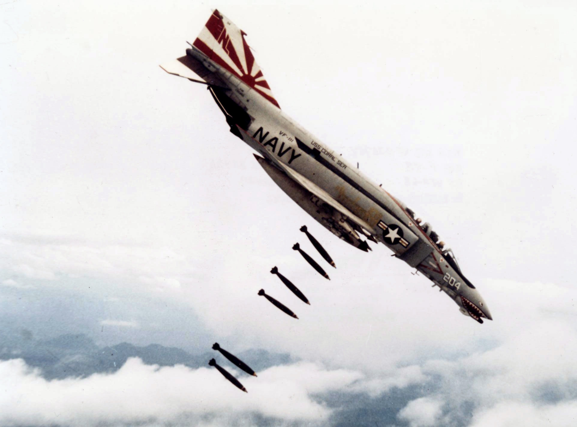 F-4B_VF-111_dropping_bombs_on_Vietnam.jp