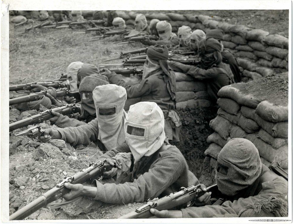 A_group_of_armed_Indian_soldiers_in_a_tr