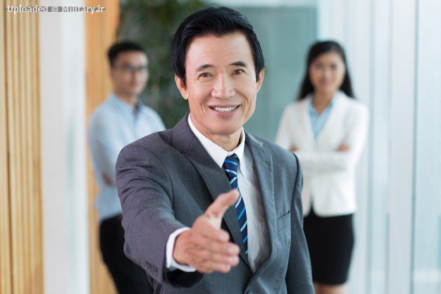smiling-senior-asian-businessman-offering-handshake_1262-2433.jpg