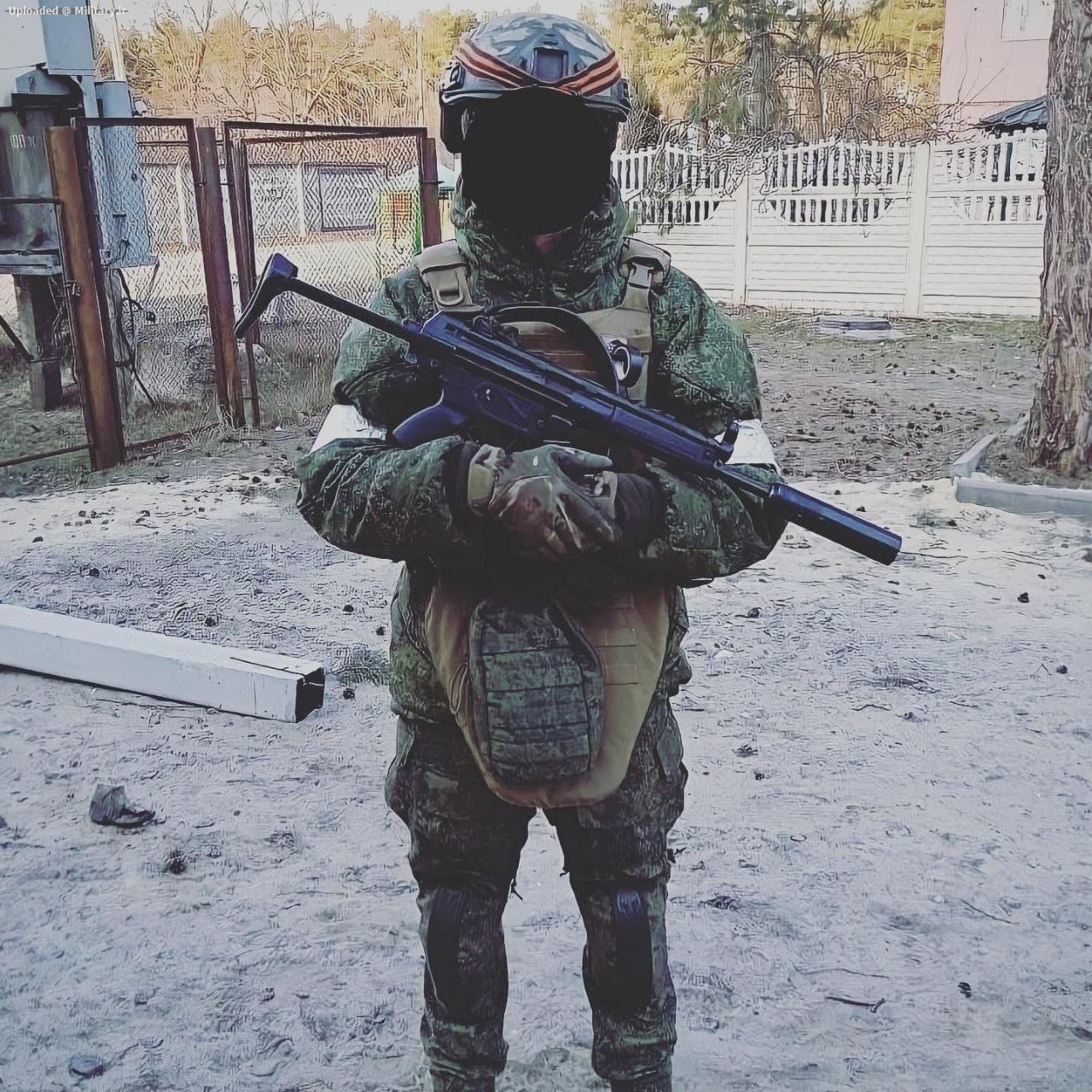 A__Russian_soldier_with_a_captured_T94A2