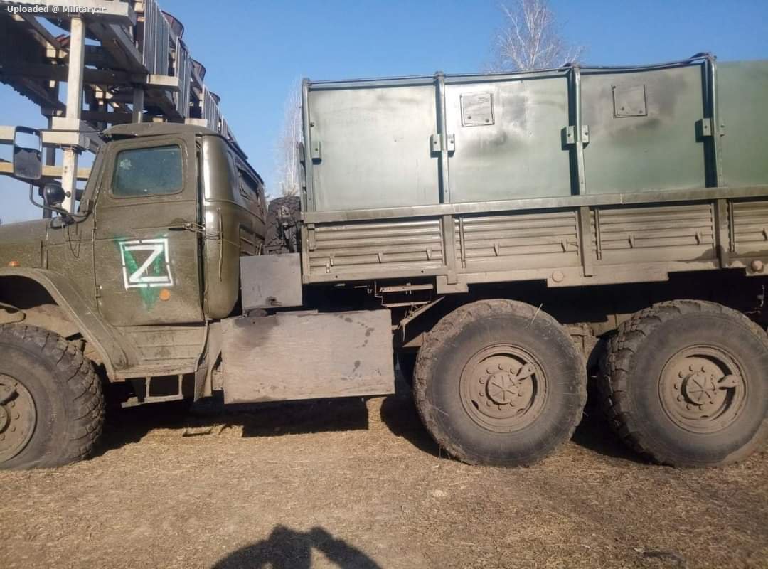 An_uncommon_Russian_Ural_6x6_with_an_arm