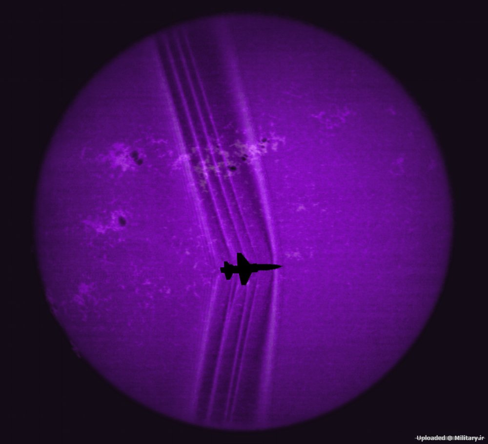 plane-against-purple-moon.jpg