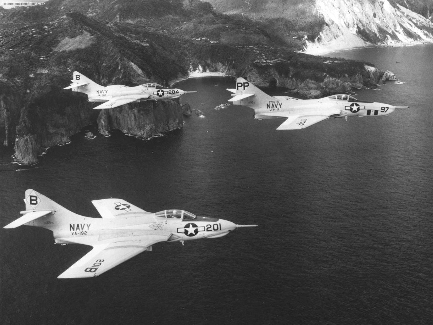 F9F_Cougars_of_VA-192_and_VFP-61_over_Fo