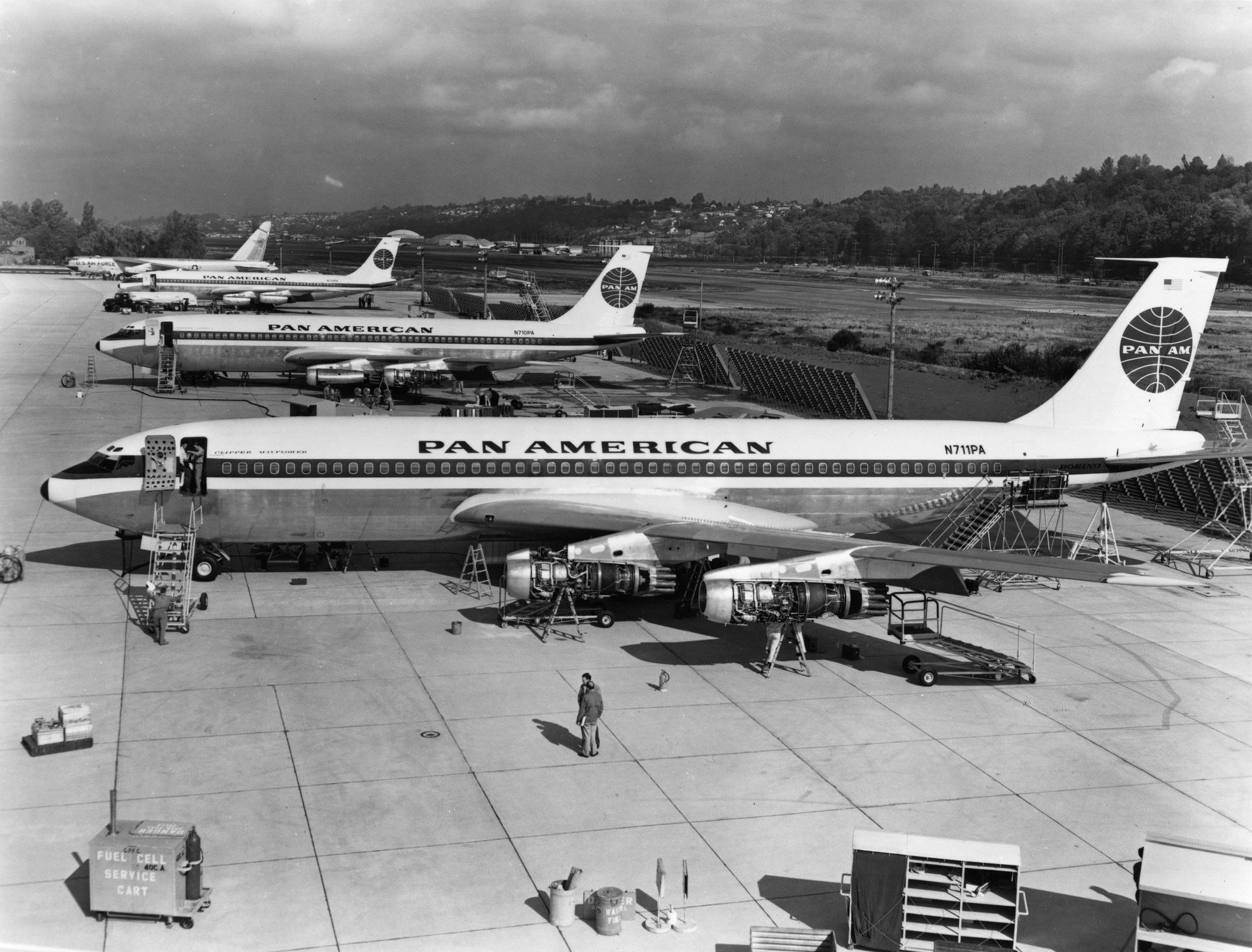 Three_Pan_Am_Boeing_707_awaiting_deliver