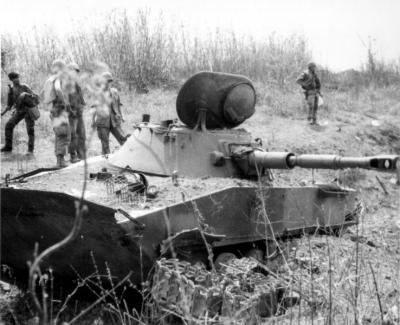 normal_Destroyed_PT76_tank_at_Ben_Het.jp