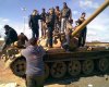 thumb_750px-People_on_a_tank_in_Benghazi